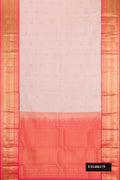 Rose Gold Dual Tone Kanchipuram Silk Saree with Zari Butta on the body and Zari Border.  displayed on a mannequin