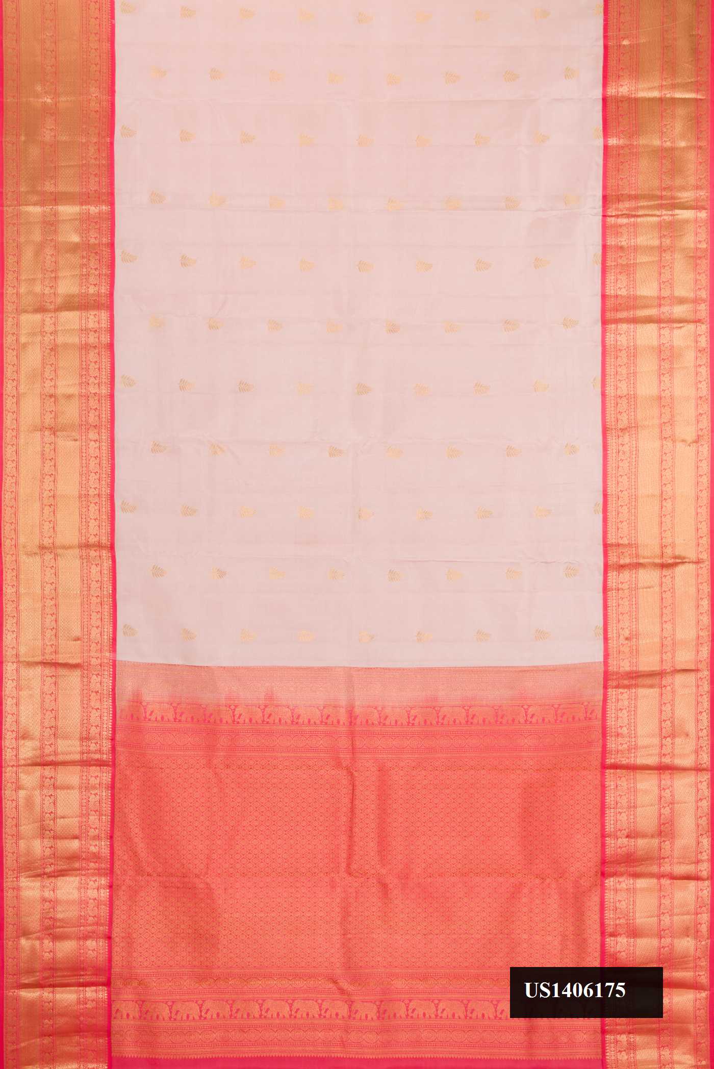 Rose Gold Dual Tone Kanchipuram Silk Saree with Zari Butta on the body and Zari Border.  displayed on a mannequin
