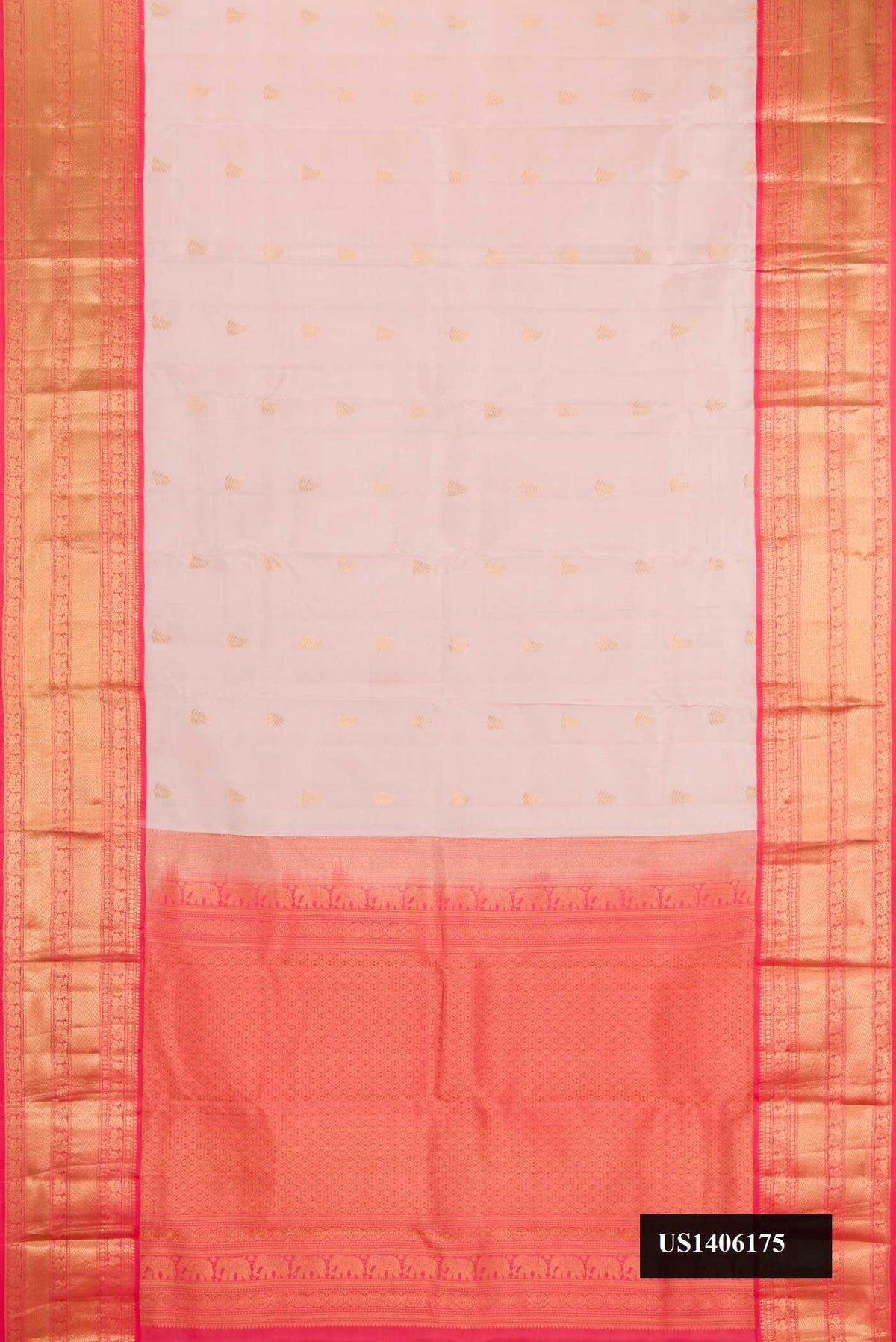 Rose Gold Dual Tone Kanchipuram Silk Saree with Zari Butta on the body and Zari Border.  displayed on a mannequin