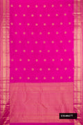 Magenta Dual Tone Kanchipuram Silk Saree with Zari Butta on the body and Zari Border.  displayed on a mannequin