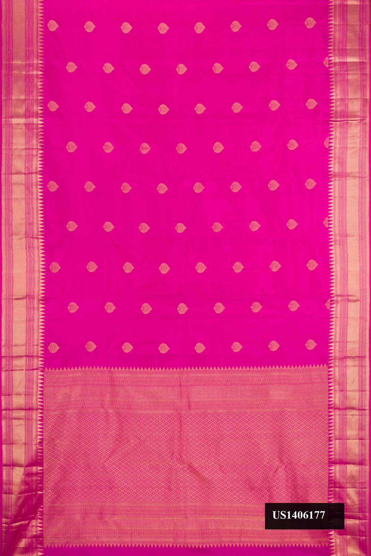 Magenta Dual Tone Kanchipuram Silk Saree with Zari Butta on the body and Zari Border.  displayed on a mannequin
