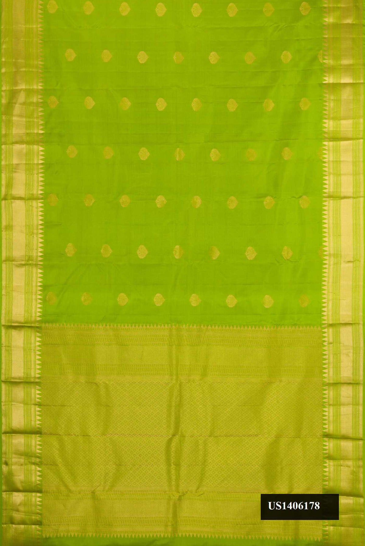 Parrot Green Dual Tone Kanchipuram Silk Saree with Zari Butta on the body and Zari Border.  displayed on a mannequin