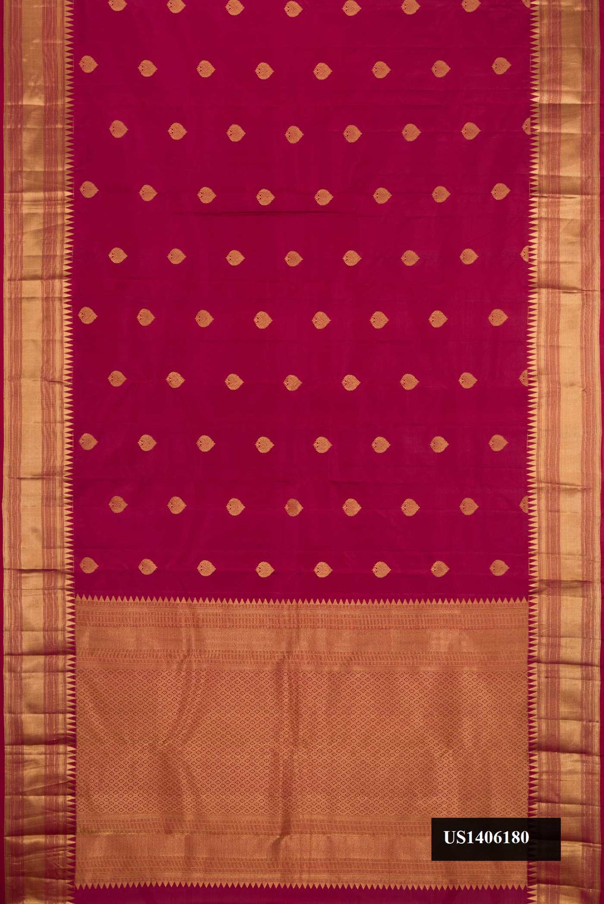 Maroon Dual Tone Kanchipuram Silk Saree with Zari Butta on the body and Zari Border.  displayed on a mannequin