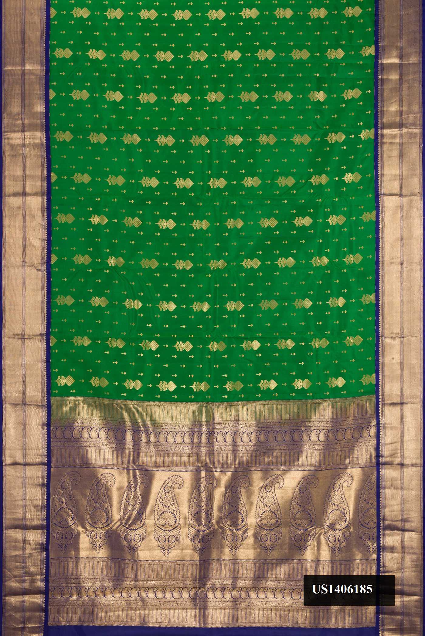 Green Dual Tone Kanchipuram Silk Saree with Zari Butta on the body and Zari Border.  displayed on a mannequin