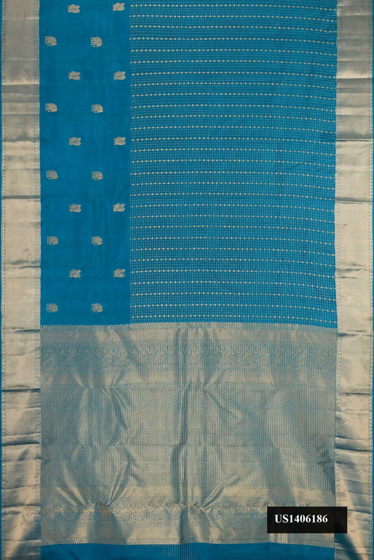 Peacock Blue Dual Tone Kanchipuram Silk Saree with Checked design on the body and Zari Border.  displayed on a mannequin