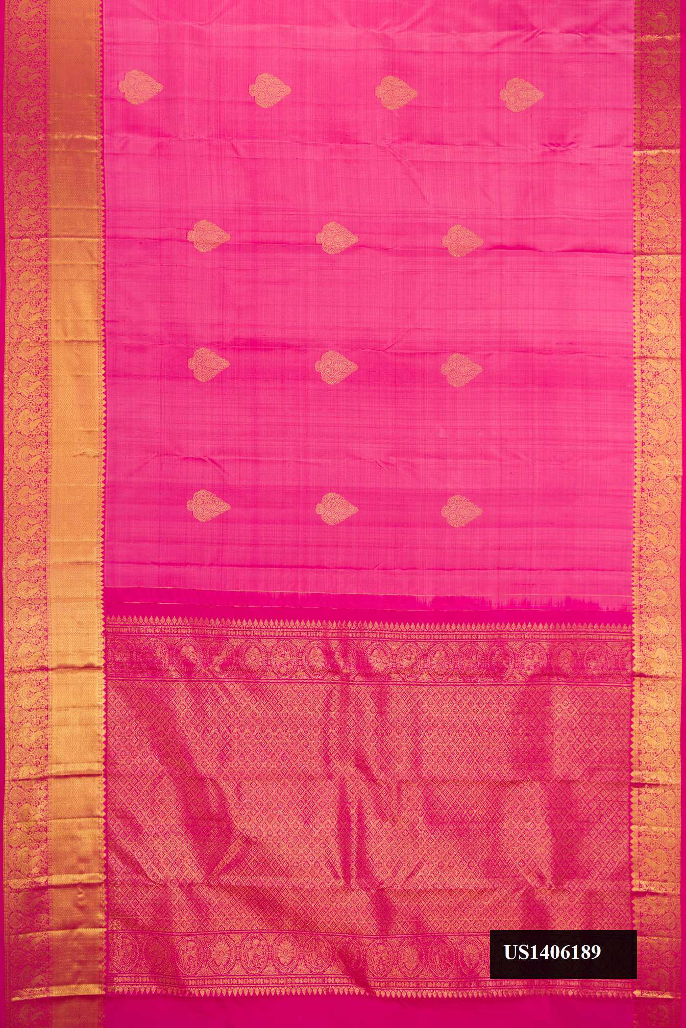 Pink Dual Tone Kanchipuram Silk Saree with Zari Butta on the body and Zari Border.  displayed on a mannequin