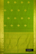 Parrot Green Dual Tone Kanchipuram Silk Saree with Zari Butta on the body and Zari Border.  displayed on a mannequin