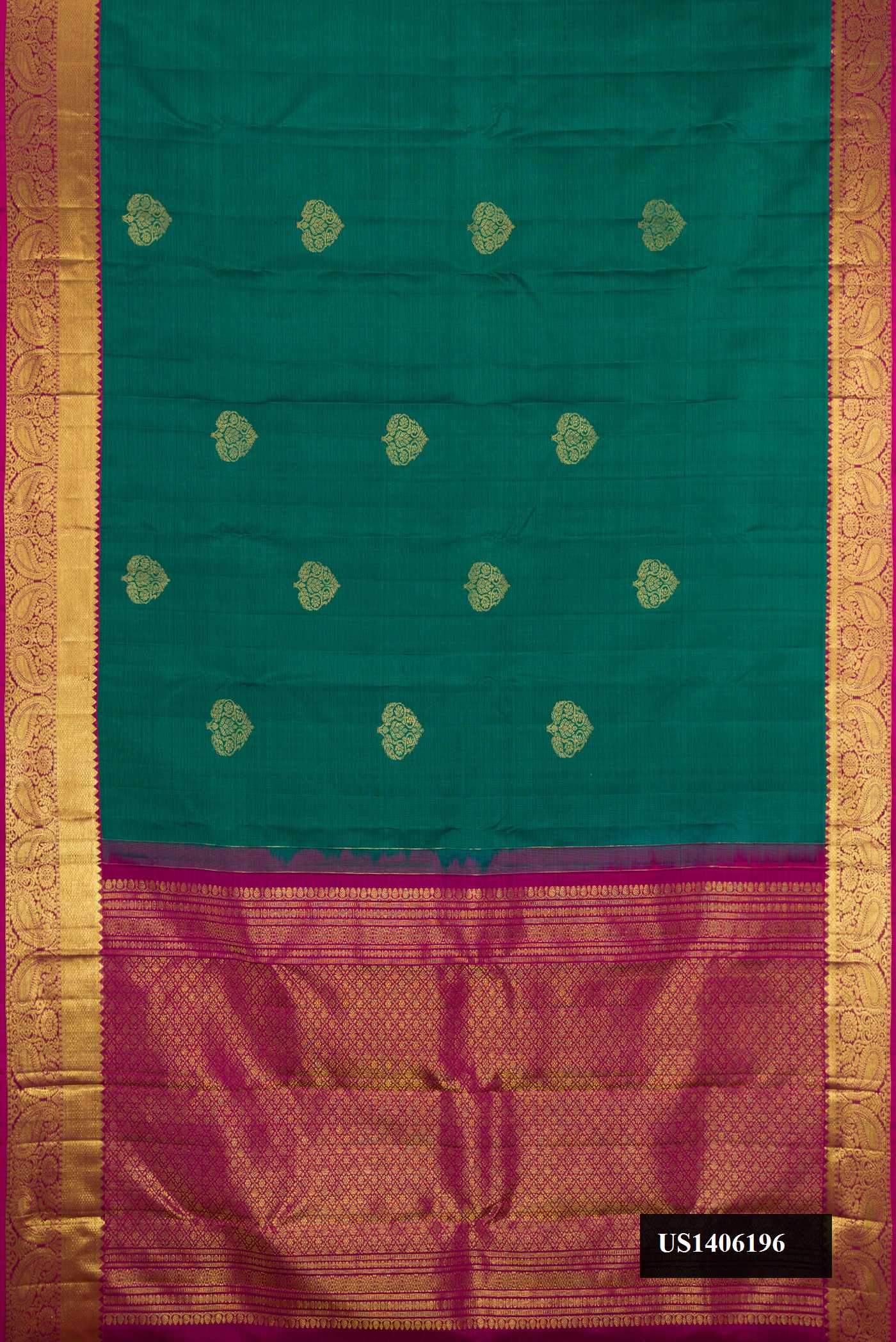 Green Dual Tone Kanchipuram Silk Saree with Zari Butta on the body and Zari Border.  displayed on a mannequin
