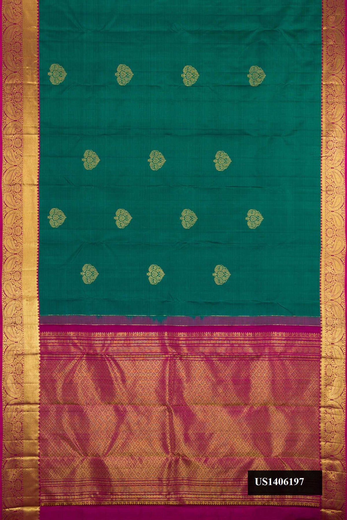 Green Dual Tone Kanchipuram Silk Saree with Zari Butta on the body and Zari Border.  displayed on a mannequin