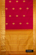 Maroon Dual Tone Kanchipuram Silk Saree with Zari Butta on the body and Zari Border.  displayed on a mannequin
