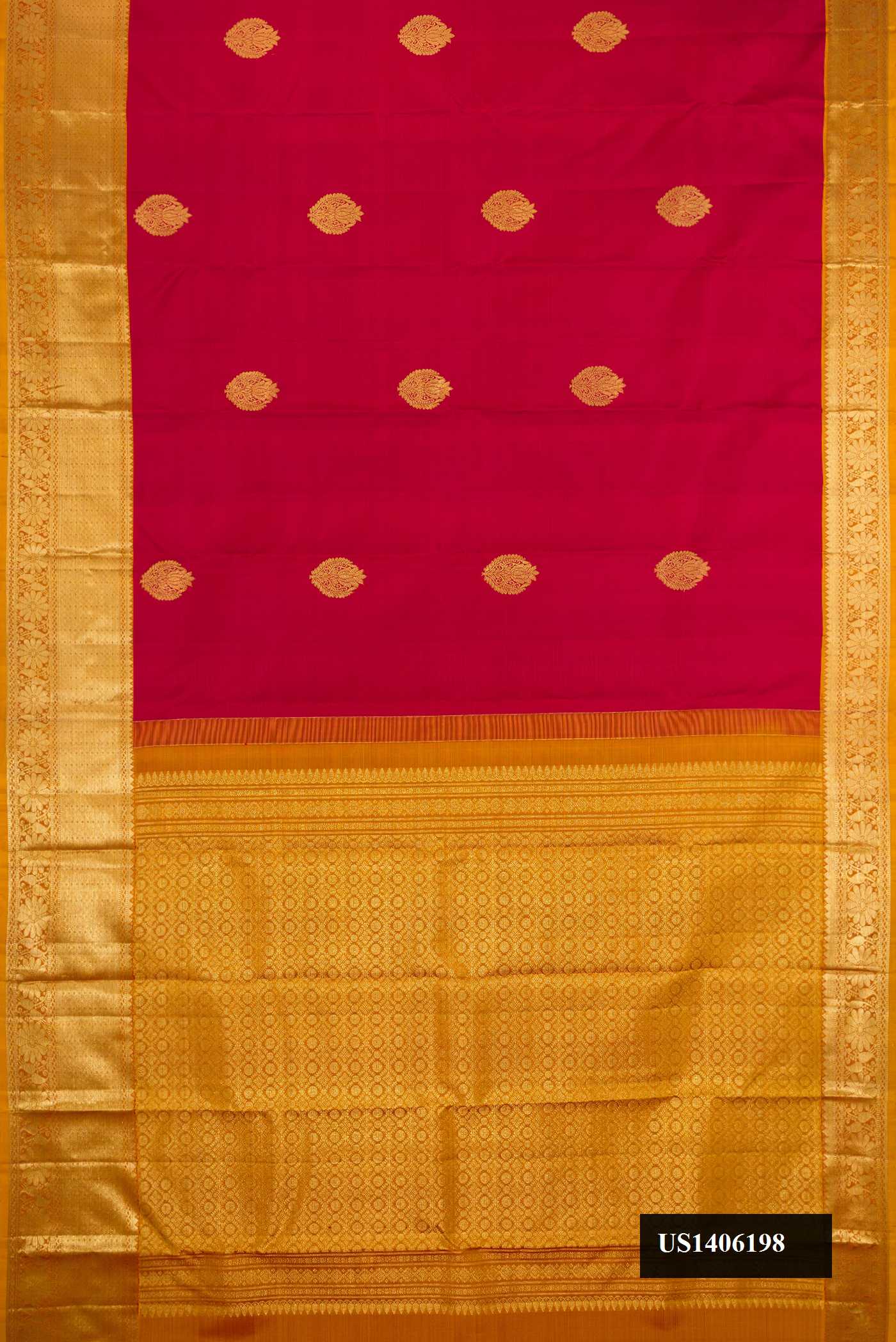 Maroon Dual Tone Kanchipuram Silk Saree with Zari Butta on the body and Zari Border.  displayed on a mannequin
