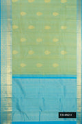 Pista Green Dual Tone Kanchipuram Silk Saree with Zari Butta on the body and Zari Border.  displayed on a mannequin