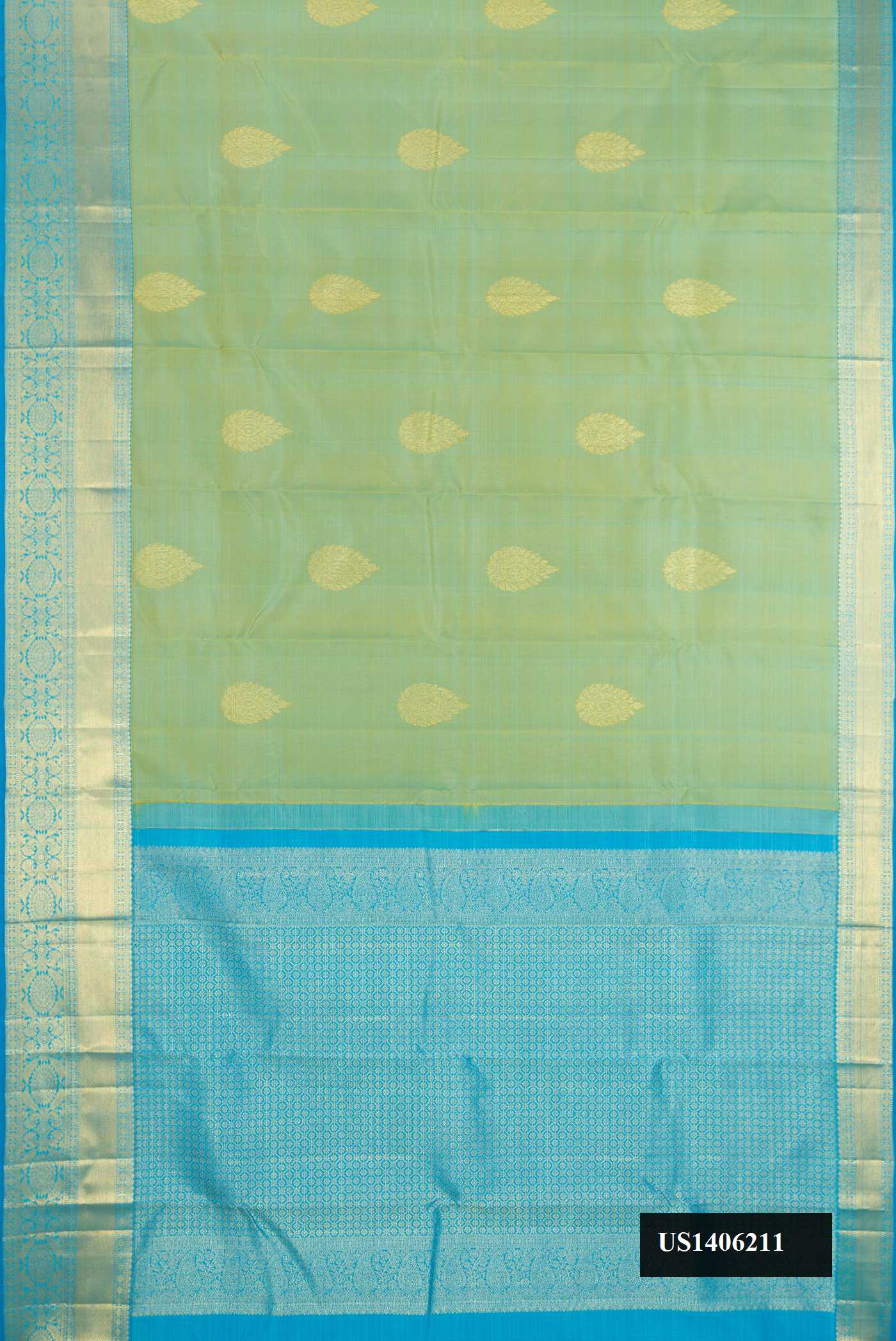 Pista Green Dual Tone Kanchipuram Silk Saree with Zari Butta on the body and Zari Border.  displayed on a mannequin