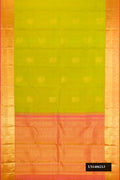Parrot Green Dual Tone Kanchipuram Silk Saree with Zari Butta on the body and Zari Border.  displayed on a mannequin