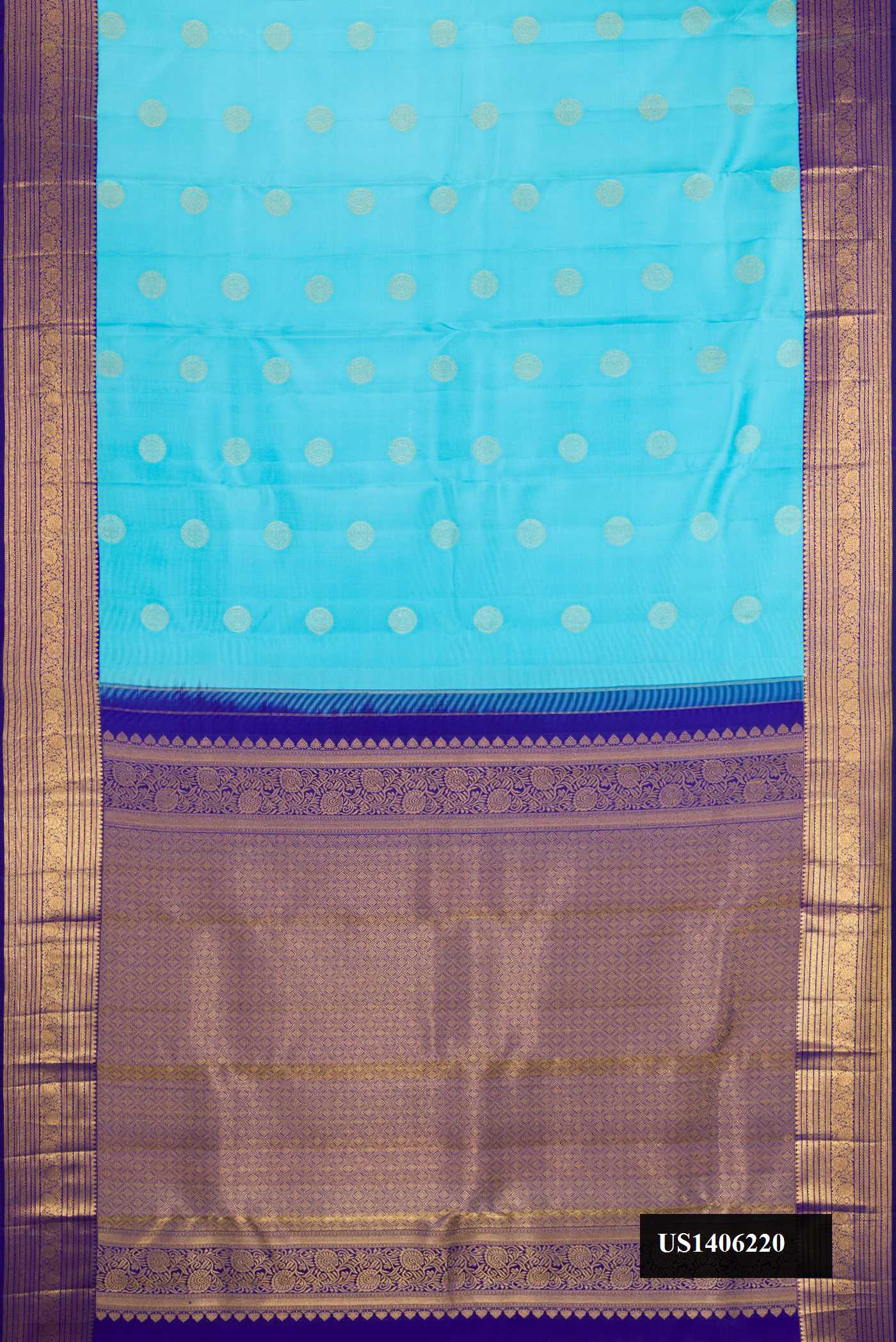 Sky Blue Dual Tone Kanchipuram Silk Saree with Zari Butta on the body and Zari Border.  displayed on a mannequin