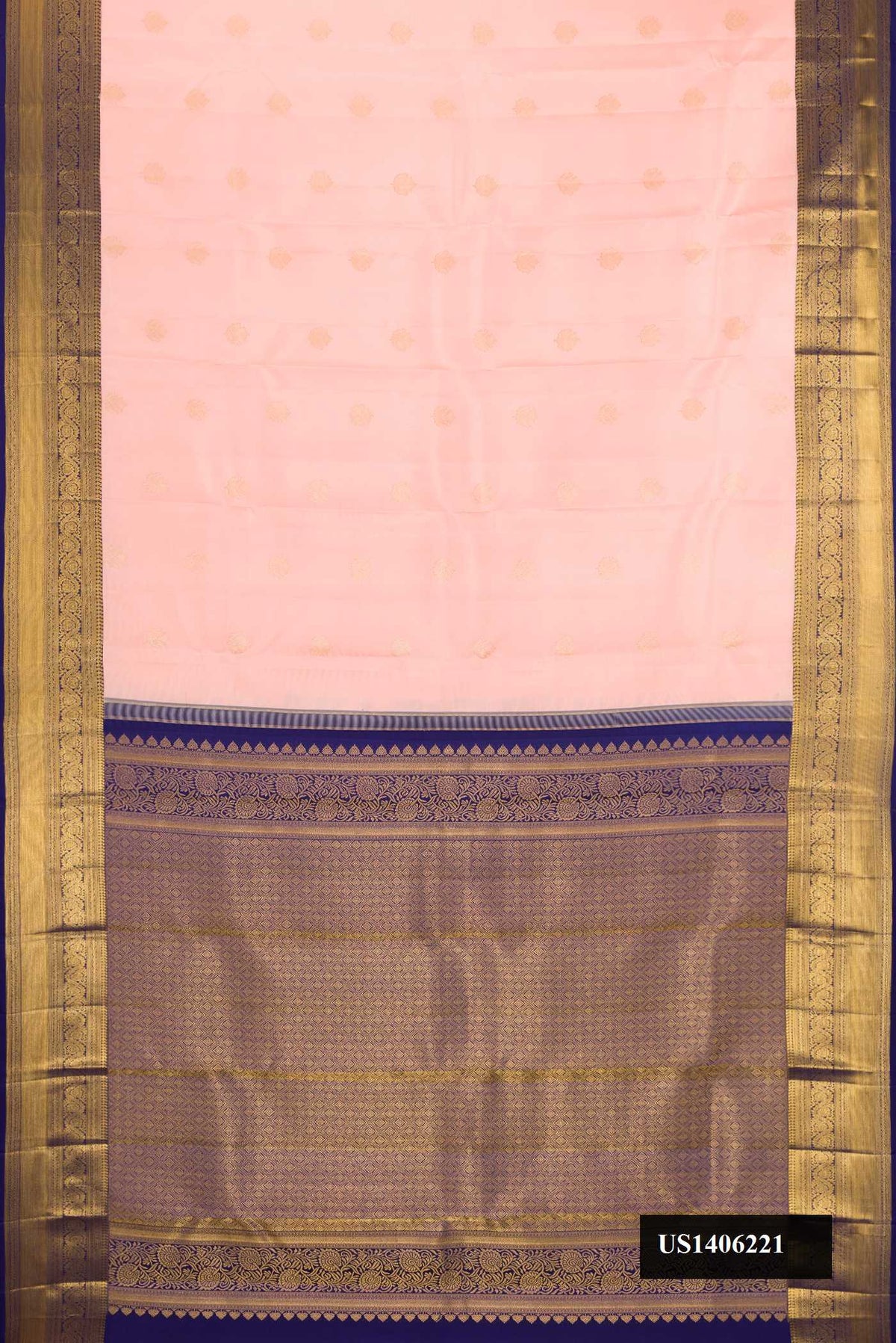 Peach Dual Tone Kanchipuram Silk Saree with Zari Butta on the body and Zari Border.  displayed on a mannequin
