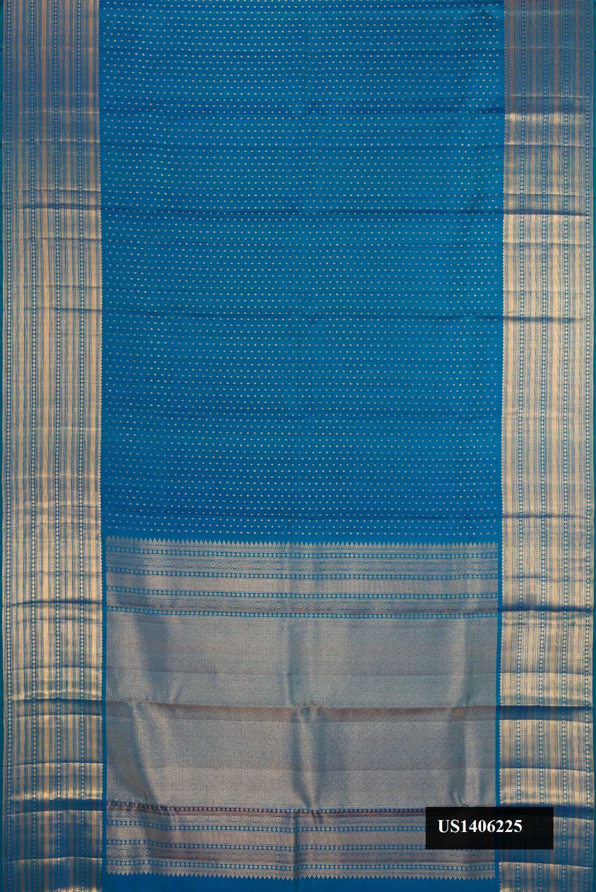 Peacock Blue Dual Tone Kanchipuram Silk Saree with Zari Butta on the body and Zari Border.  displayed on a mannequin
