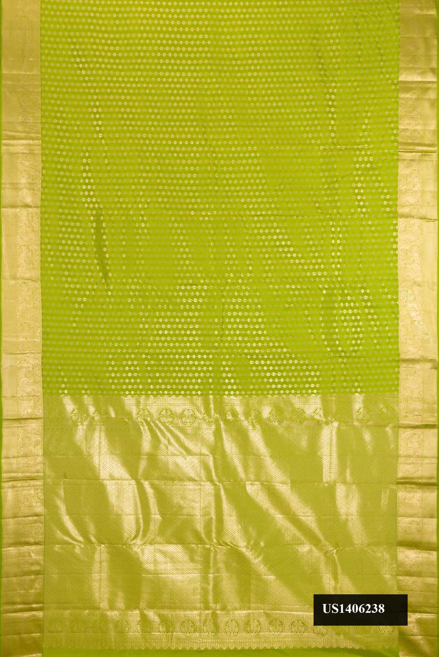 Parrot Green Dual Tone Kanchipuram Silk Saree with Zari Butta on the body and Zari Border.  displayed on a mannequin