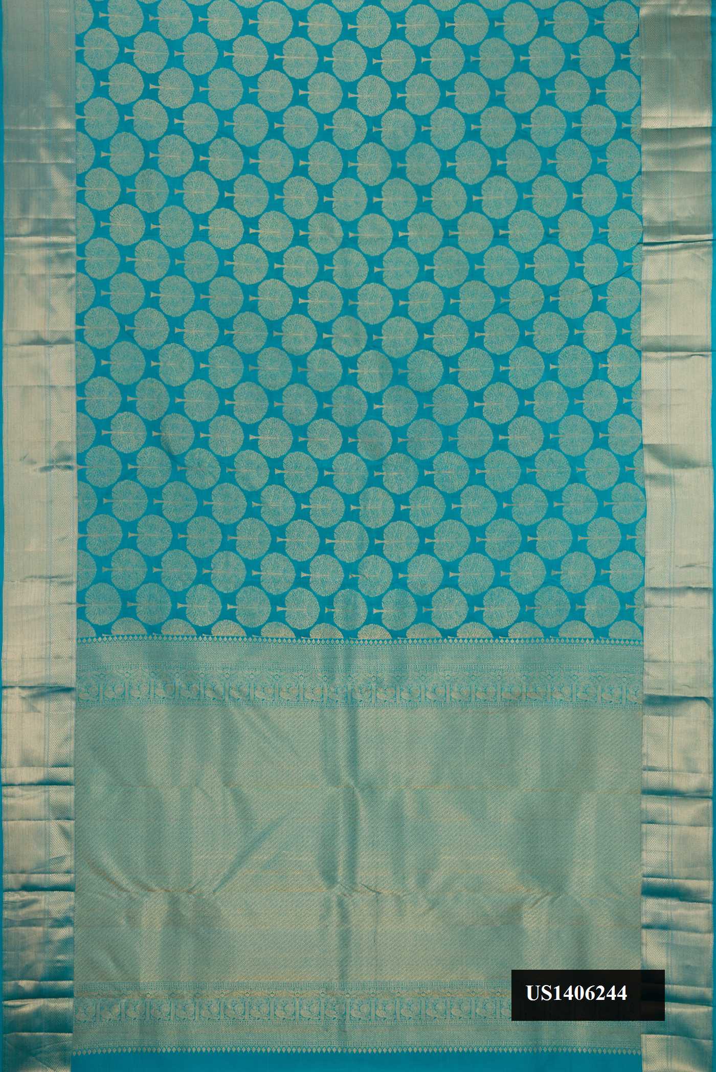 Peacock Blue Dual Tone Kanchipuram Silk Saree with Zari Brocade on the body and Zari Border.  displayed on a mannequin