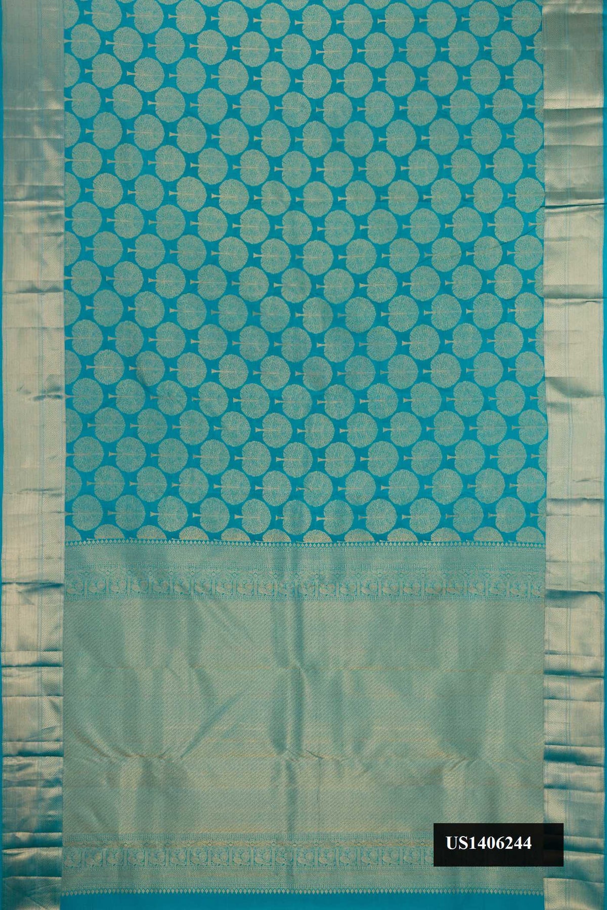 Peacock Blue Dual Tone Kanchipuram Silk Saree with Zari Brocade on the body and Zari Border.  displayed on a mannequin