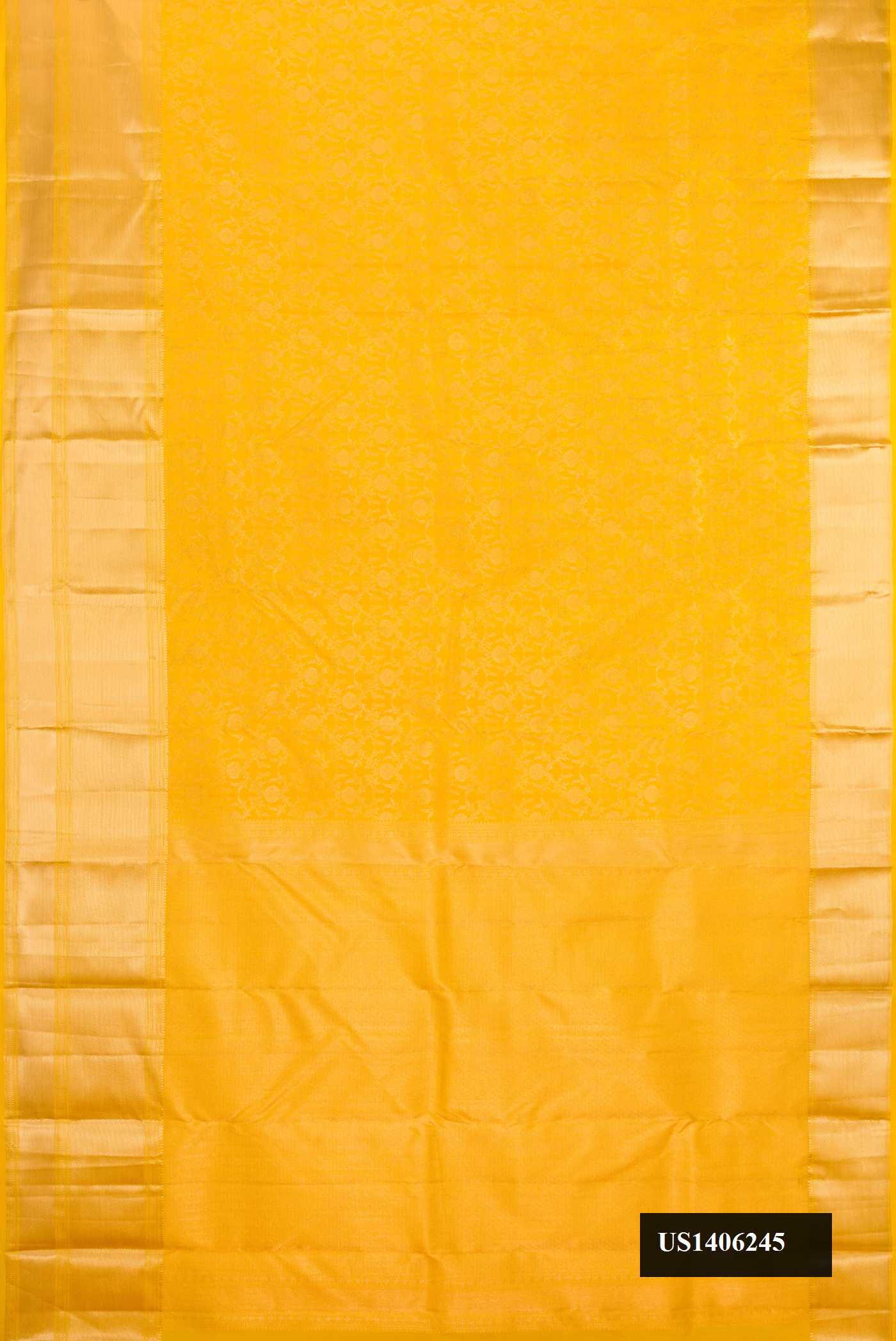 Yellow Dual Tone Kanchipuram Silk Saree with Zari Brocade on the body and Zari Border.  displayed on a mannequin