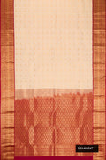 Sandal Dual Tone Kanchipuram Silk Saree with Zari Brocade on the body and Zari Border.  displayed on a mannequin