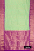 Pista Green Dual Tone Kanchipuram Silk Saree with Zari Brocade on the body and Zari Border.  displayed on a mannequin