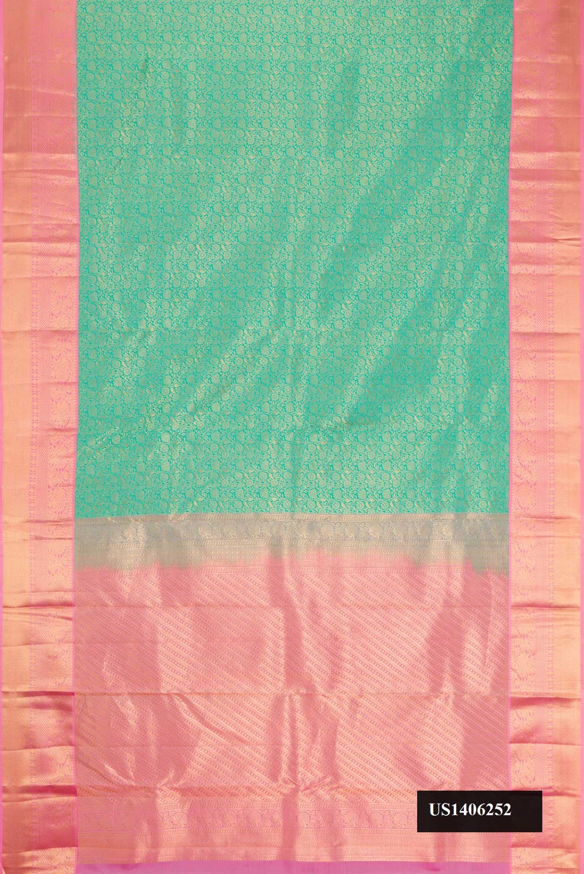 Sea Green Dual Tone Kanchipuram Silk Saree with Zari Brocade on the body and Zari Border.  displayed on a mannequin