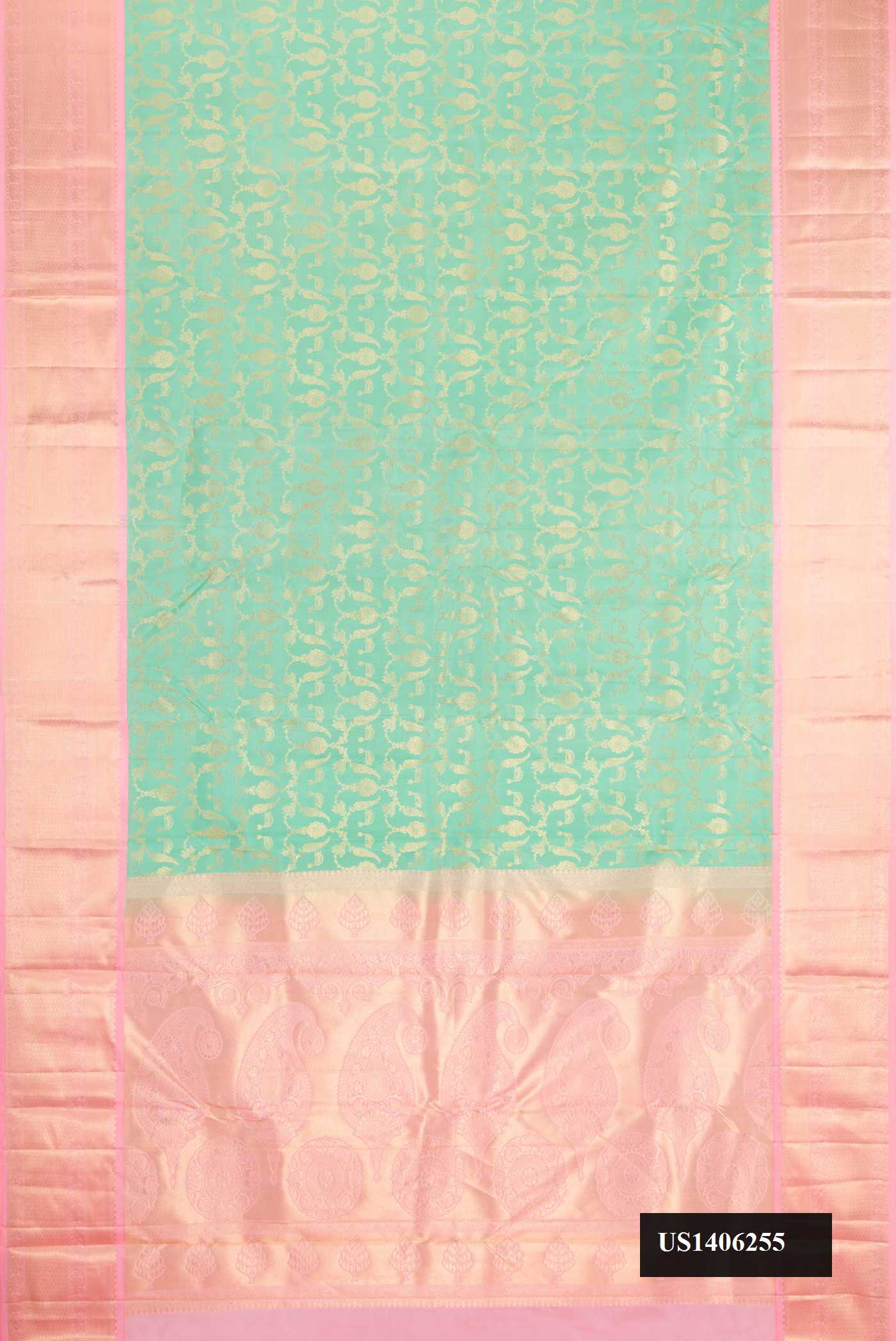 Sea Green Dual Tone Kanchipuram Silk Saree with Zari Brocade on the body and Zari Border.  displayed on a mannequin