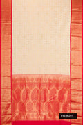Beige Dual Tone Kanchipuram Silk Saree with Zari Brocade on the body and Zari Border.  displayed on a mannequin