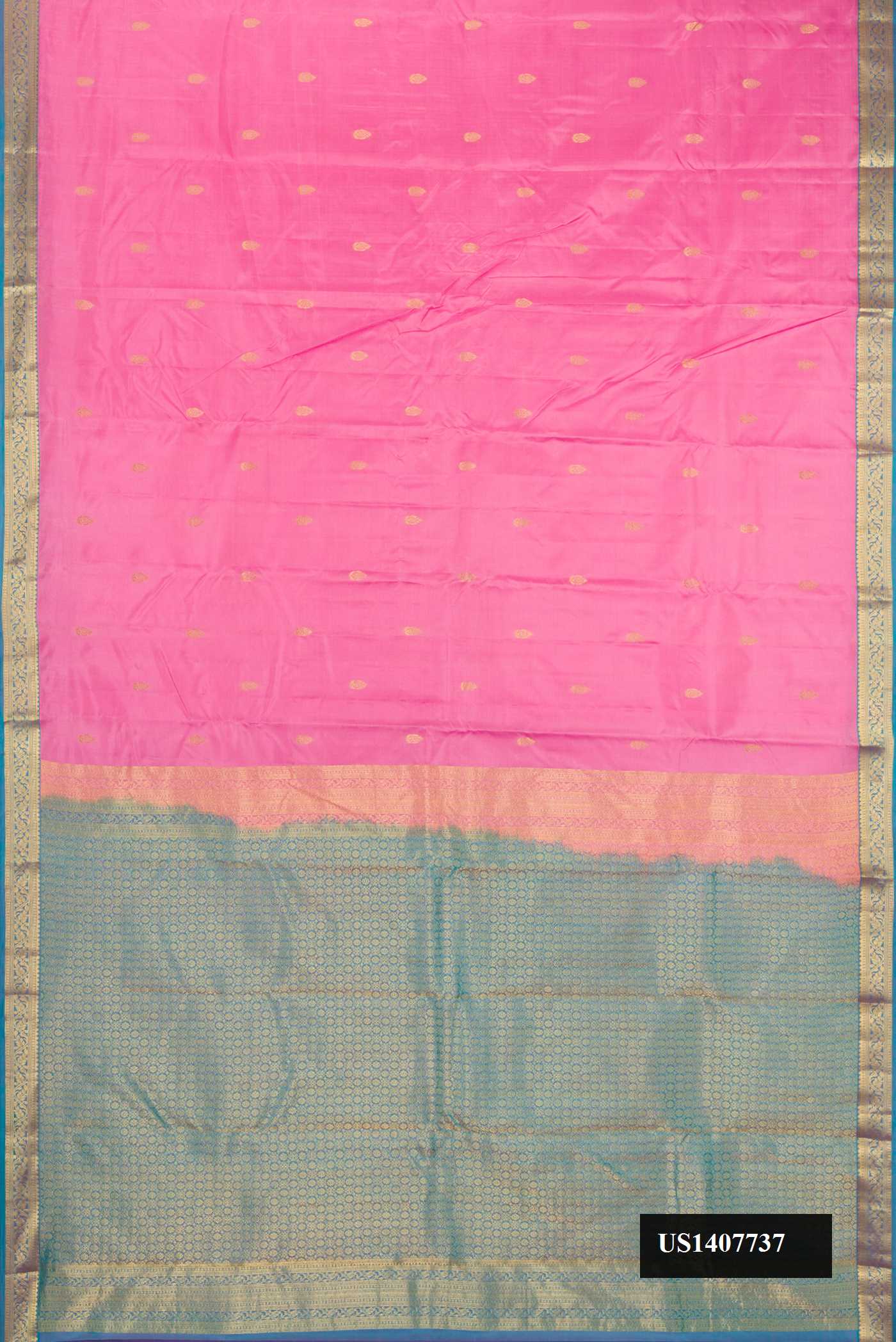 Pink Dual Tone Kanchipuram Silk Saree with Zari Butta on the body and Zari Border.  displayed on a mannequin