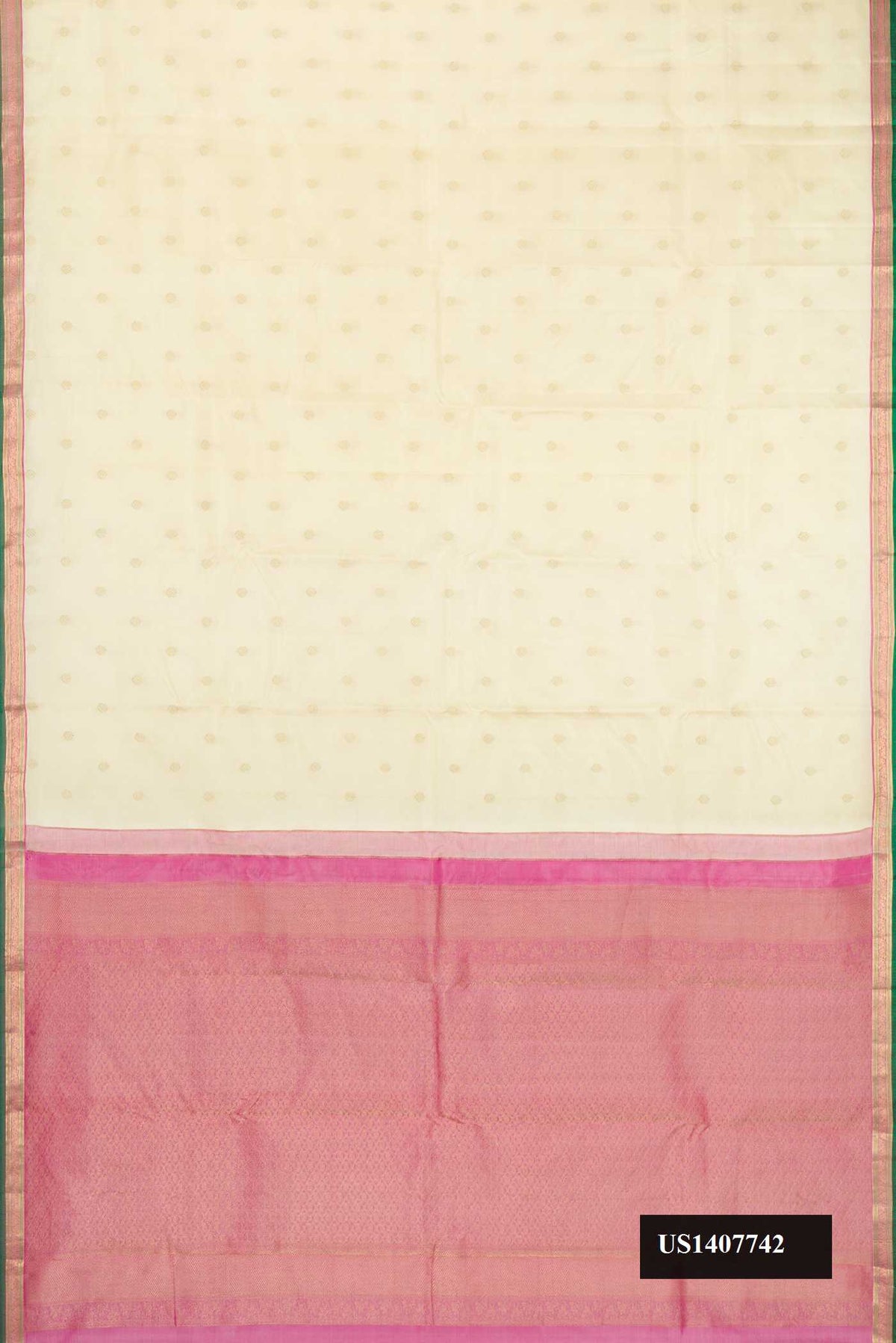 Beige Dual Tone Kanchipuram Silk Saree with Zari Butta on the body and Zari Border.  displayed on a mannequin