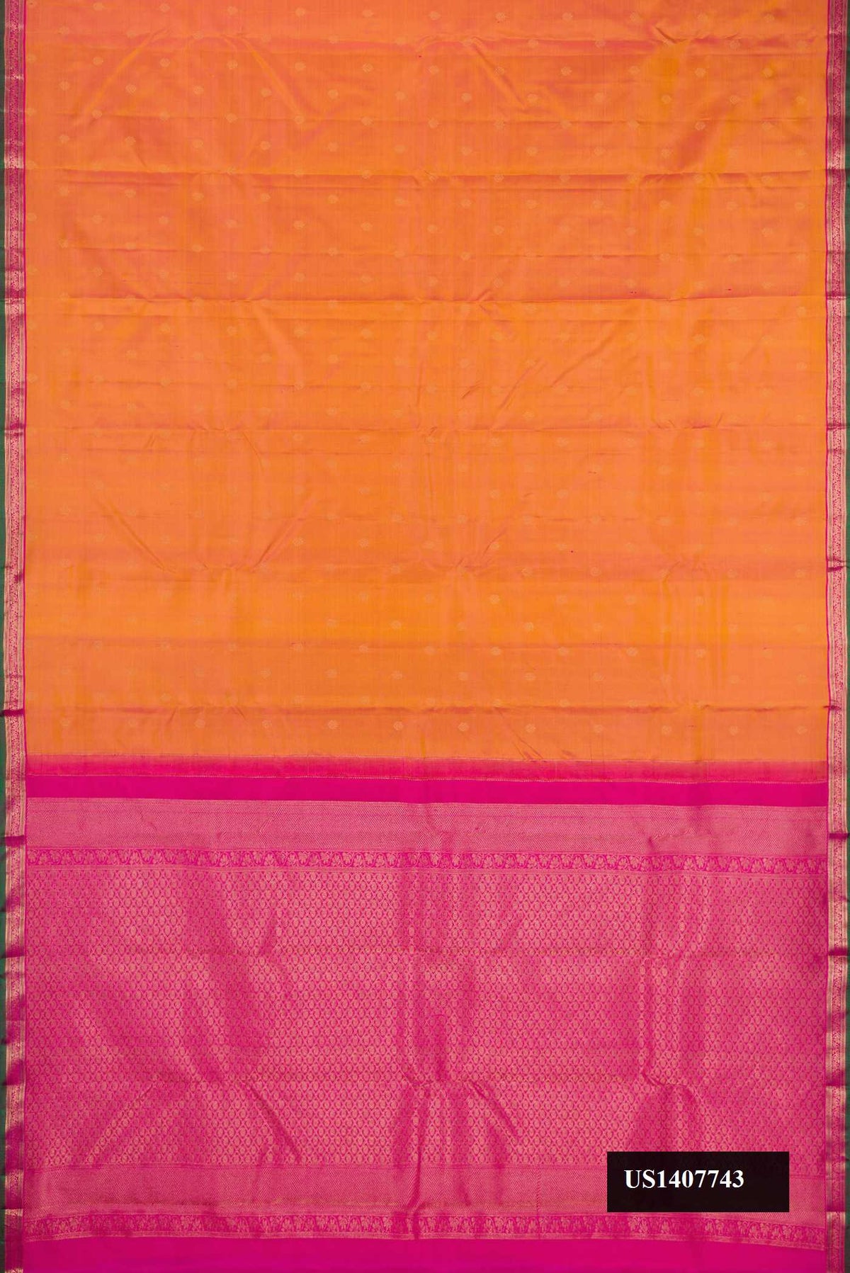 Coral Dual Tone Kanchipuram Silk Saree with Zari Butta on the body and Zari Border.  displayed on a mannequin