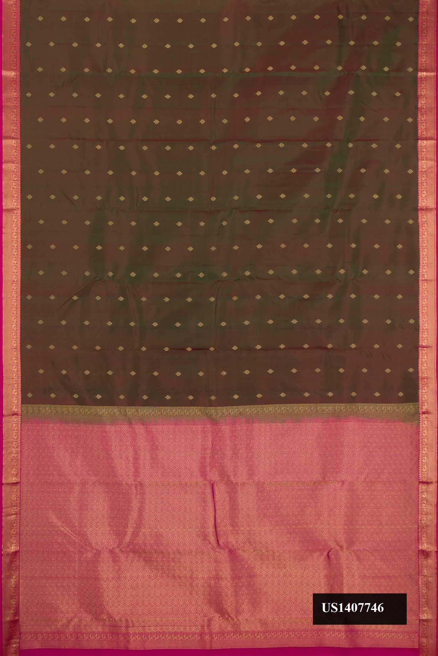 Mehandi Green Dual Tone Kanchipuram Silk Saree with Zari Butta on the body and Zari Border.  displayed on a mannequin