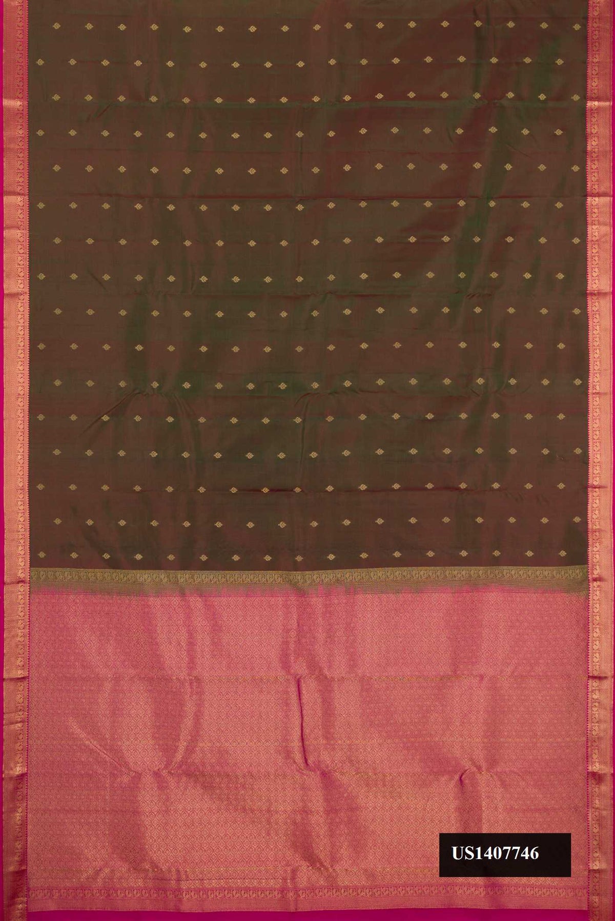 Mehandi Green Dual Tone Kanchipuram Silk Saree with Zari Butta on the body and Zari Border.  displayed on a mannequin