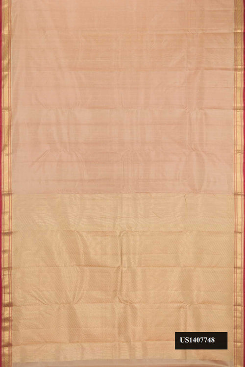 Beige Dual Tone Kanchipuram Silk Saree with Stripes on the body and Zari Border.  displayed on a mannequin