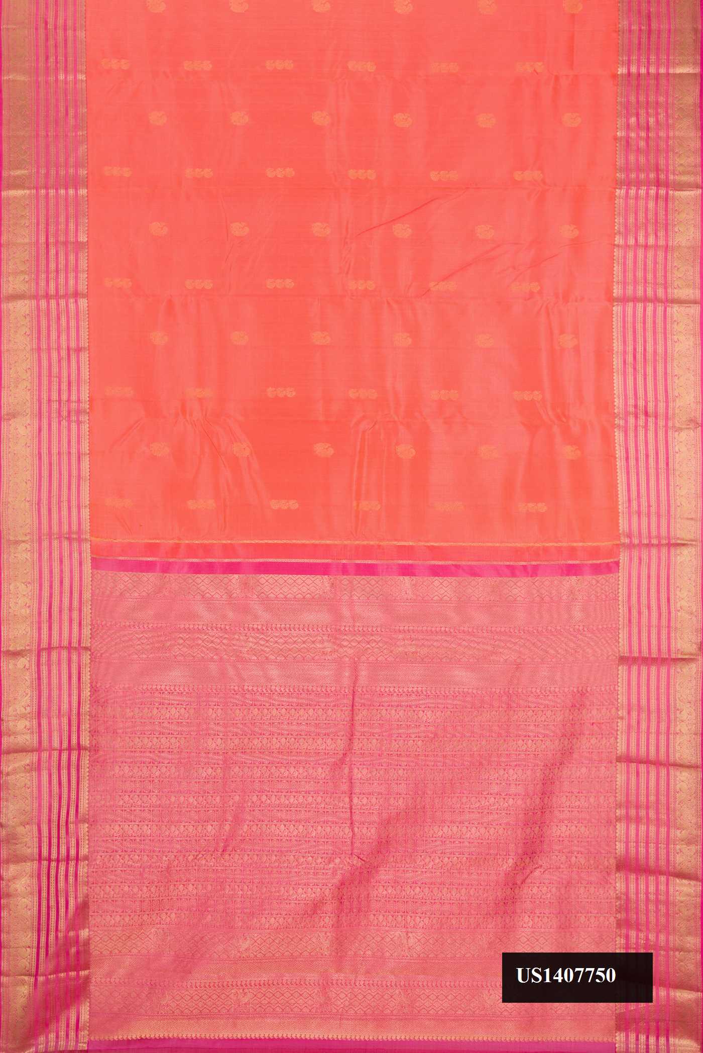 Peach Dual Tone Kanchipuram Silk Saree with Zari Butta on the body and Zari Border.  displayed on a mannequin