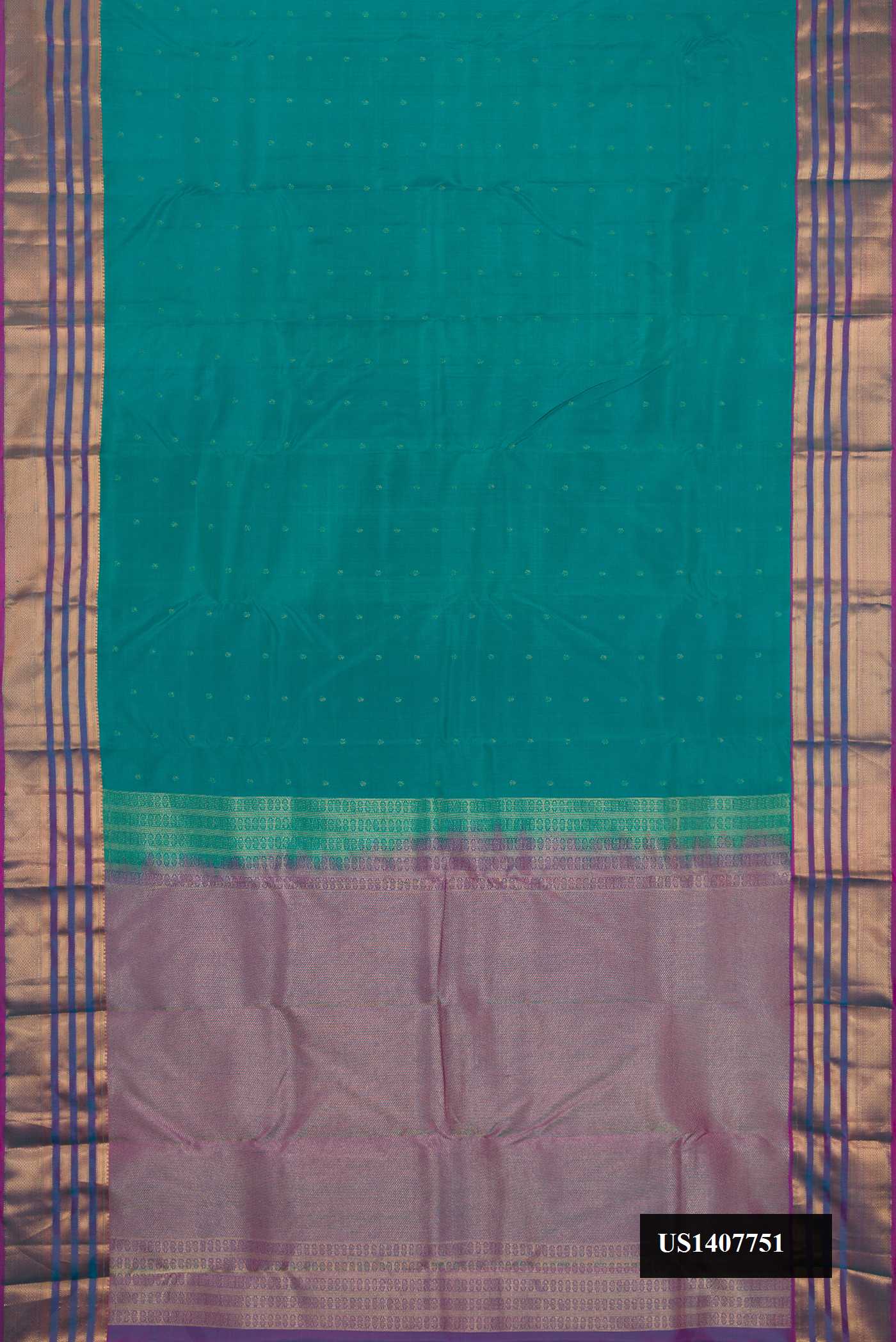 Green Dual Tone Kanchipuram Silk Saree with Zari Butta on the body and Zari Border.  displayed on a mannequin