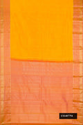 Yellow Dual Tone Kanchipuram Silk Saree with Zari Butta on the body and Zari Border.  displayed on a mannequin