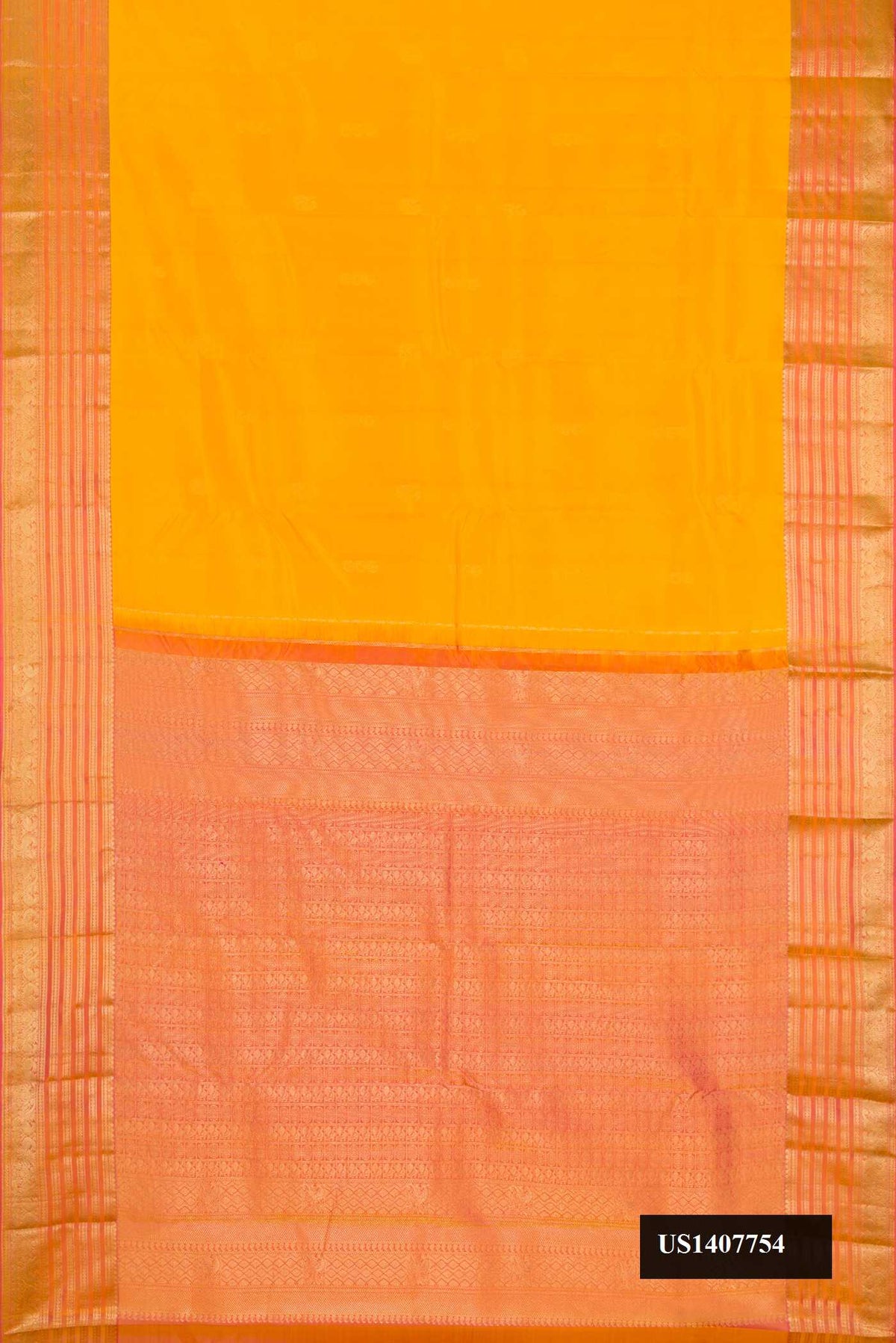 Yellow Dual Tone Kanchipuram Silk Saree with Zari Butta on the body and Zari Border.  displayed on a mannequin