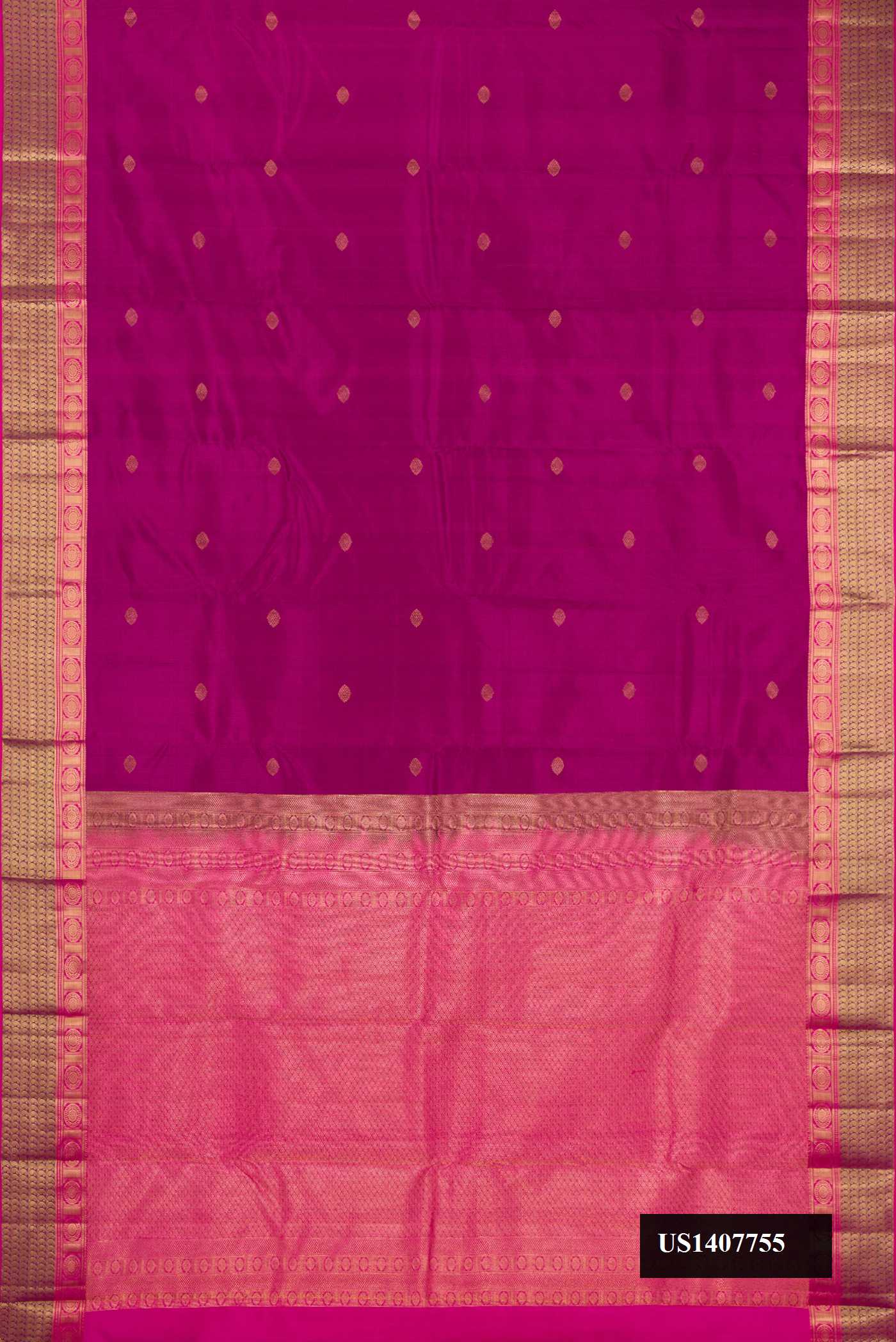 Magenta Dual Tone Kanchipuram Silk Saree with Zari Butta on the body and Zari Border.  displayed on a mannequin