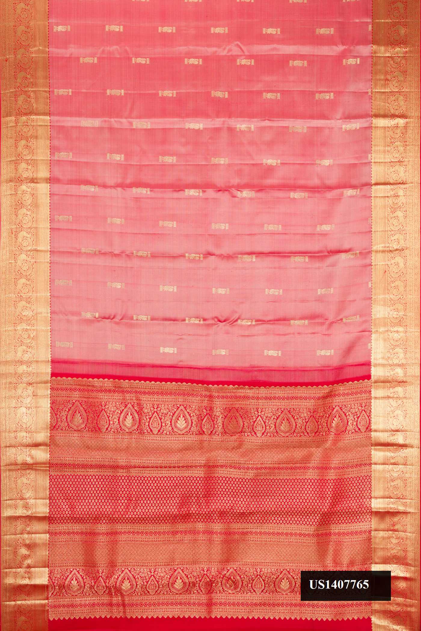 Rose Gold Dual Tone Kanchipuram Silk Saree with Zari Butta on the body and Zari Border.  displayed on a mannequin