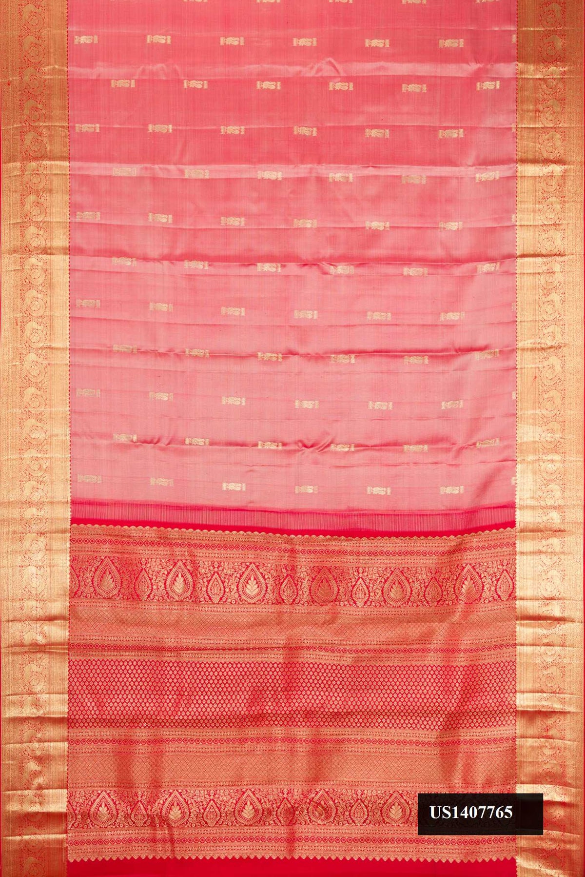Rose Gold Dual Tone Kanchipuram Silk Saree with Zari Butta on the body and Zari Border.  displayed on a mannequin