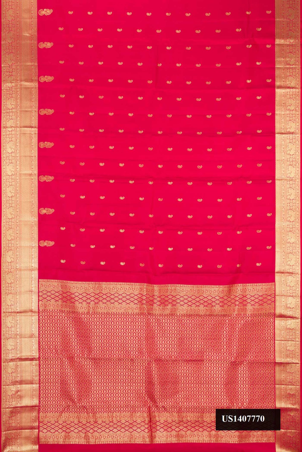 Dark Pink Dual Tone Kanchipuram Silk Saree with Zari Butta on the body and Zari Border.  displayed on a mannequin