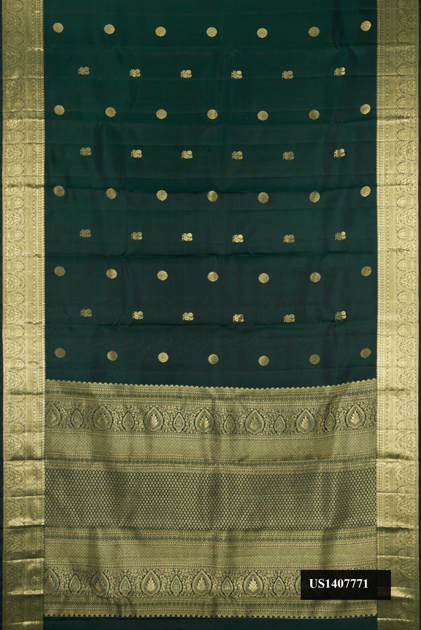 Bottle Green Dual Tone Kanchipuram Silk Saree with Zari Butta on the body and Zari Border.  displayed on a mannequin