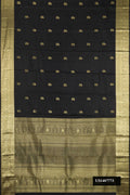 Black Dual Tone Kanchipuram Silk Saree with Zari Butta on the body and Zari Border.  displayed on a mannequin