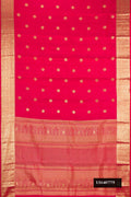 Dark Pink Dual Tone Kanchipuram Silk Saree with Zari Butta on the body and Zari Border.  displayed on a mannequin