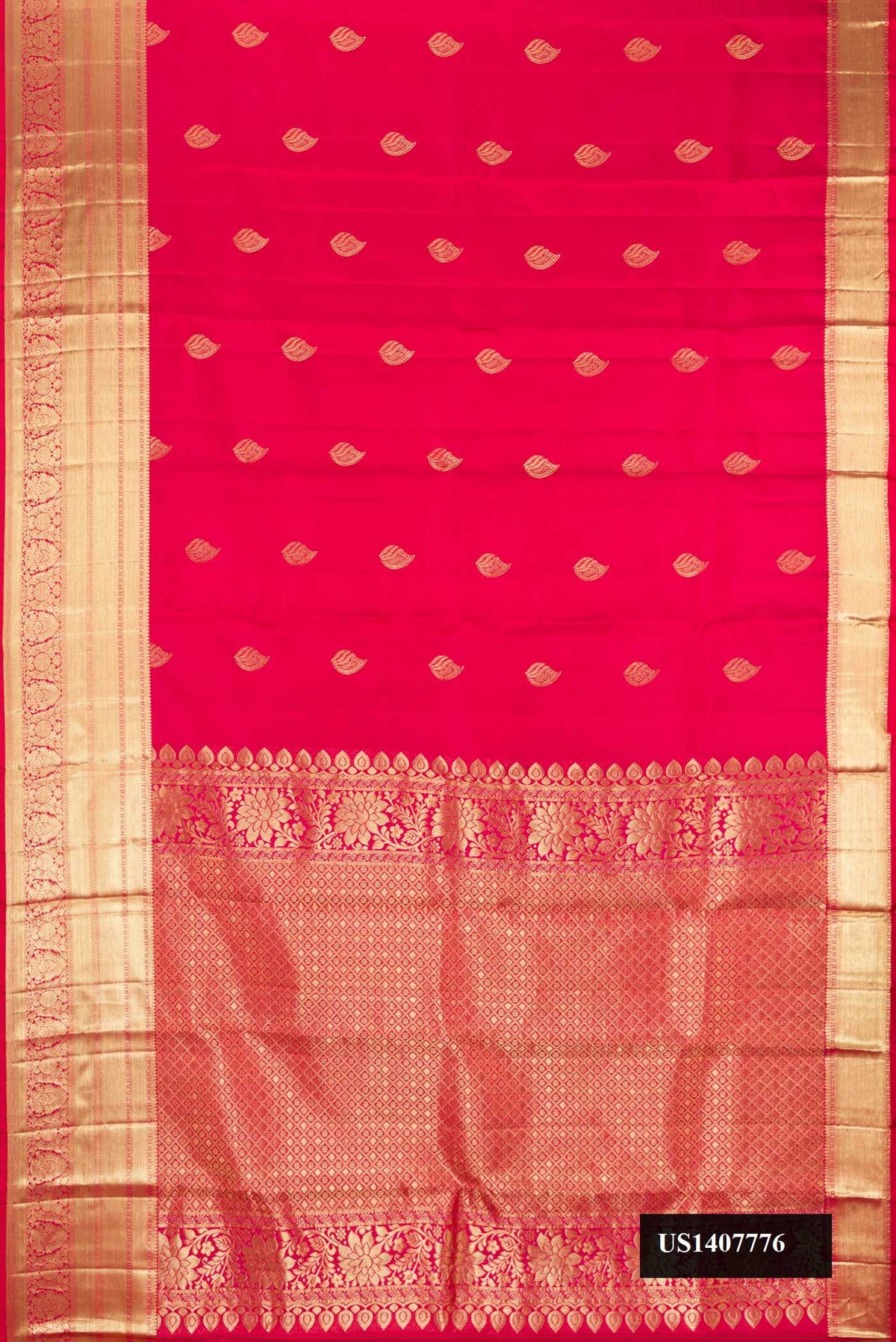 Dark Pink Dual Tone Kanchipuram Silk Saree with Zari Butta on the body and Zari Border.  displayed on a mannequin