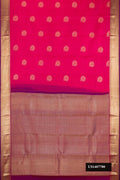 Magenta Dual Tone Kanchipuram Silk Saree with Zari Butta on the body and Zari Border.  displayed on a mannequin