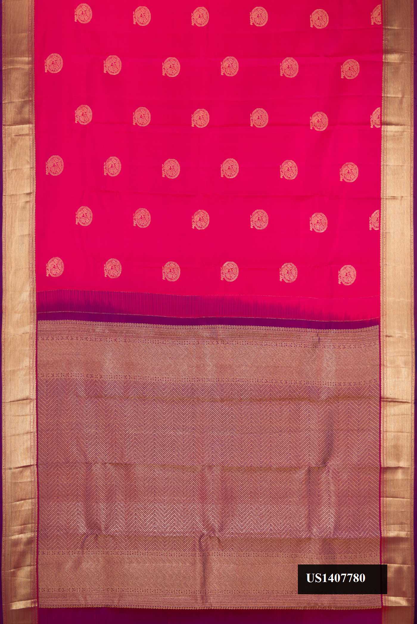 Magenta Dual Tone Kanchipuram Silk Saree with Zari Butta on the body and Zari Border.  displayed on a mannequin